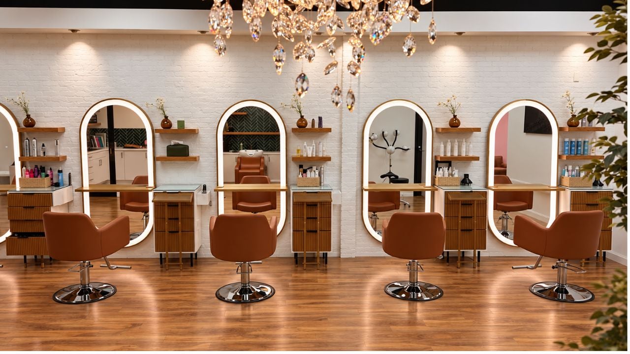 Luxury micro salon with five styling stations and LED mirrors at Manelli Studios in Aliso Viejo, CA