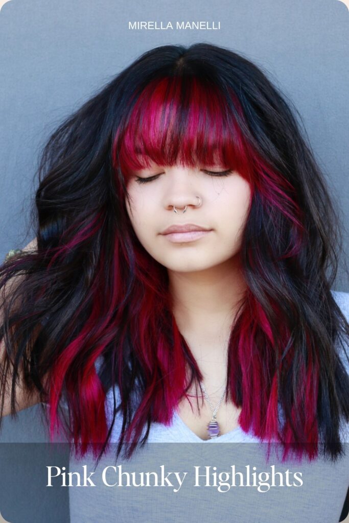 Pink chunky highlights and bangs on black hair