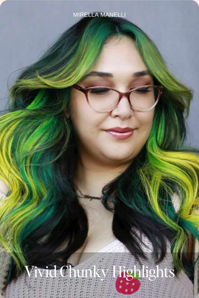 Green and yellow vivid chunky highlights on dark hair